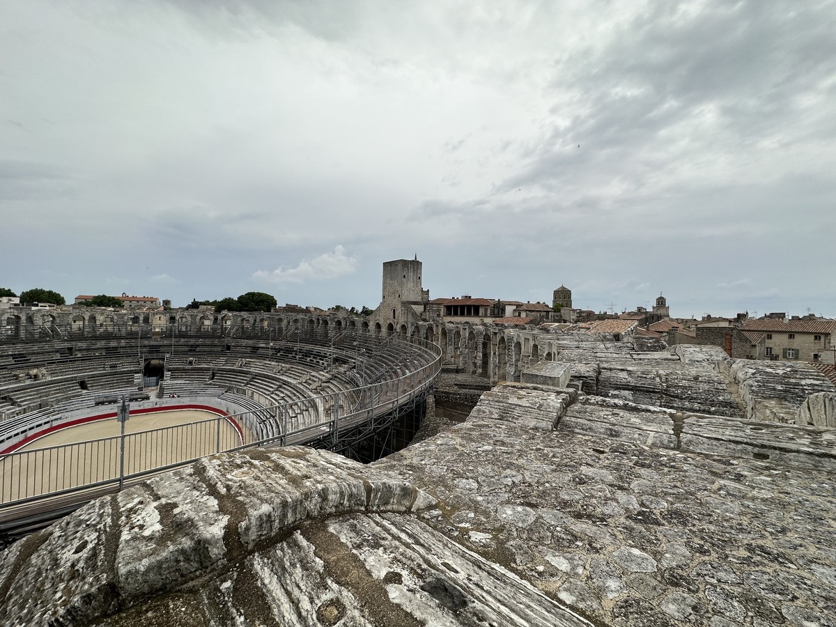 Panoramic view from inside the Arles Amphitheater looking across the arena from the upper tiers