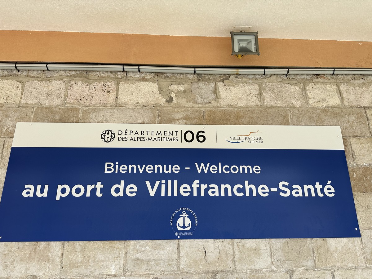 Welcome sign at the port of Villefranche-sur-Mer on the French Riviera