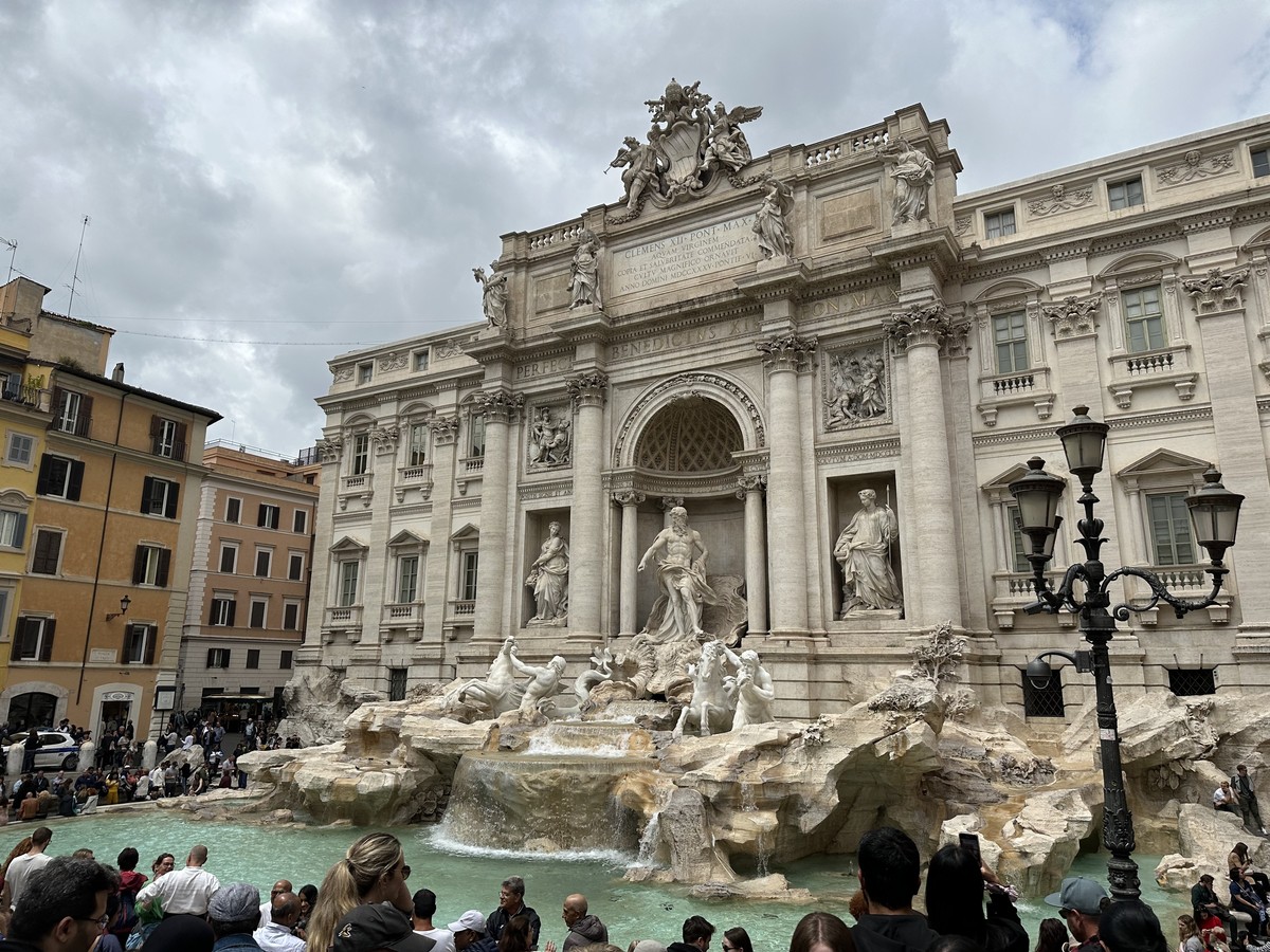The Trevi Fountain in Rome with its Baroque sculptures and cascading water