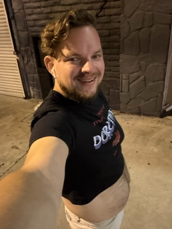 Nighttime selfie outside a stone building in Los Angeles