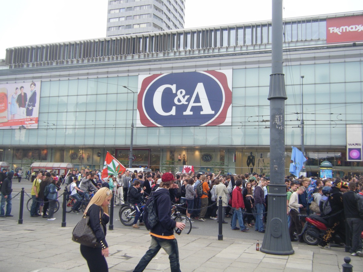 Warsaw street scene with pedestrians and rebuilt architecture