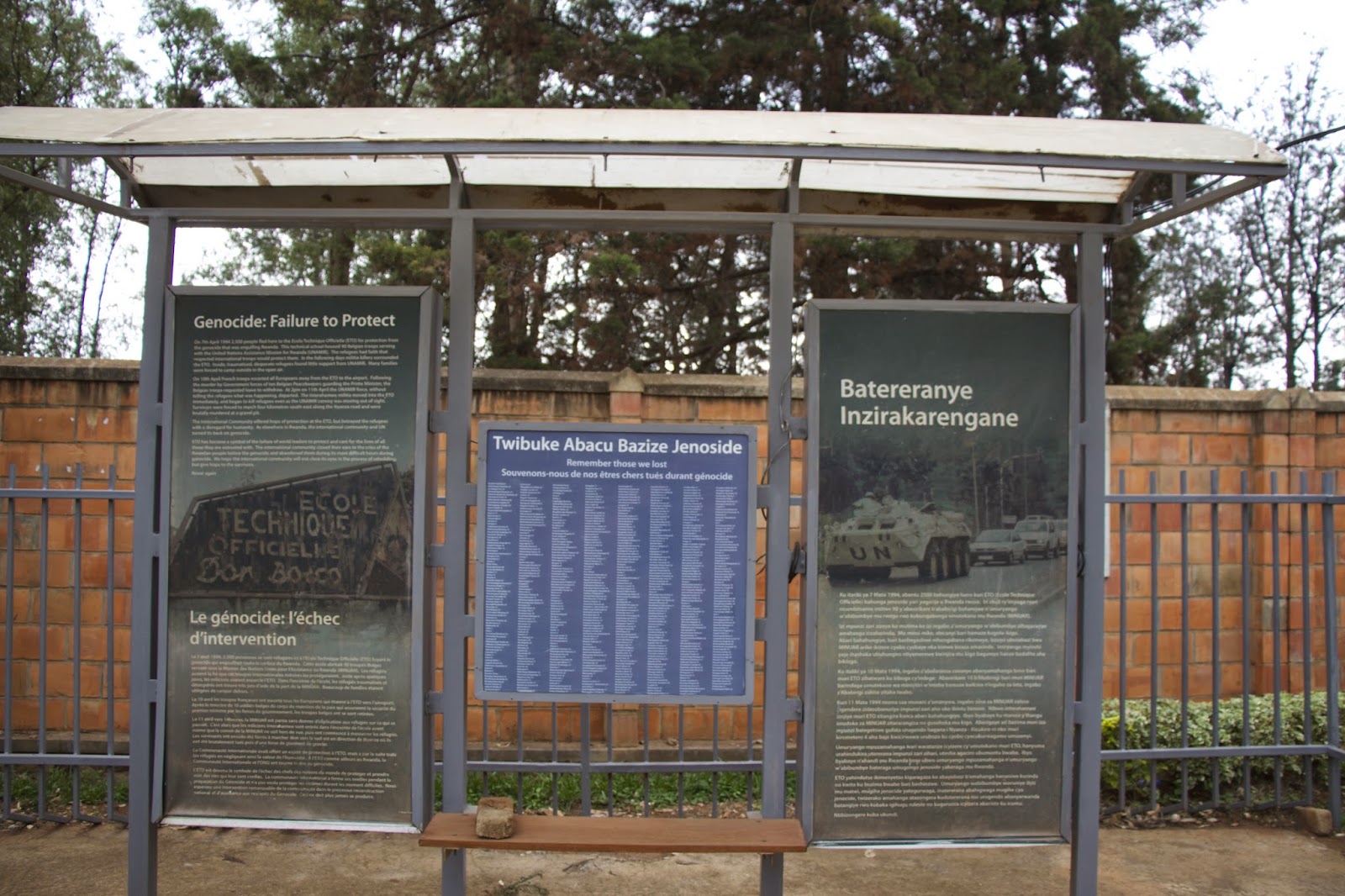 Information display panels at the ETO memorial titled Genocide: Failure to Protect, with a list of victims and historical photos