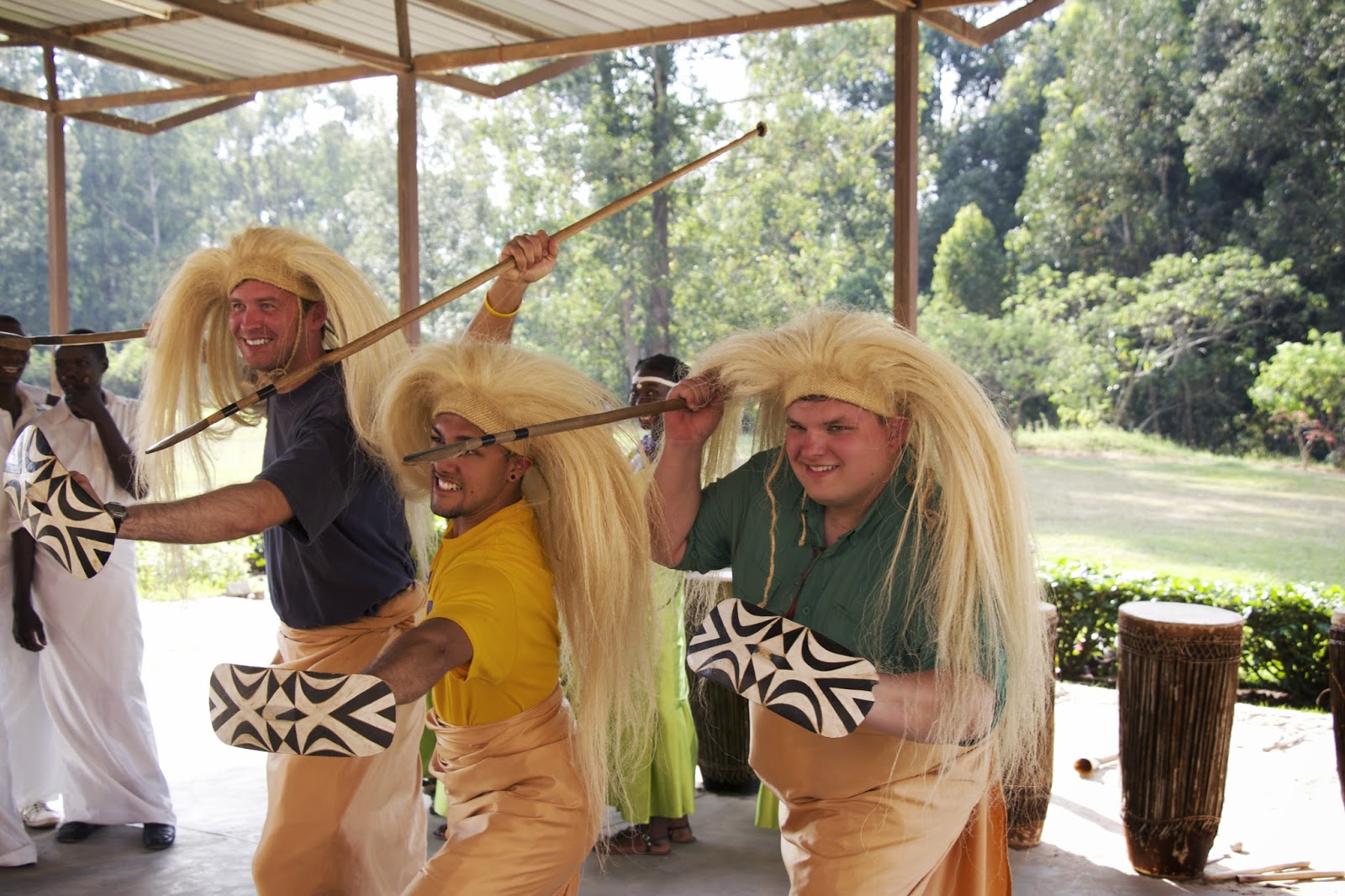 Group photo of the WCU warriors posing with tribal dancers