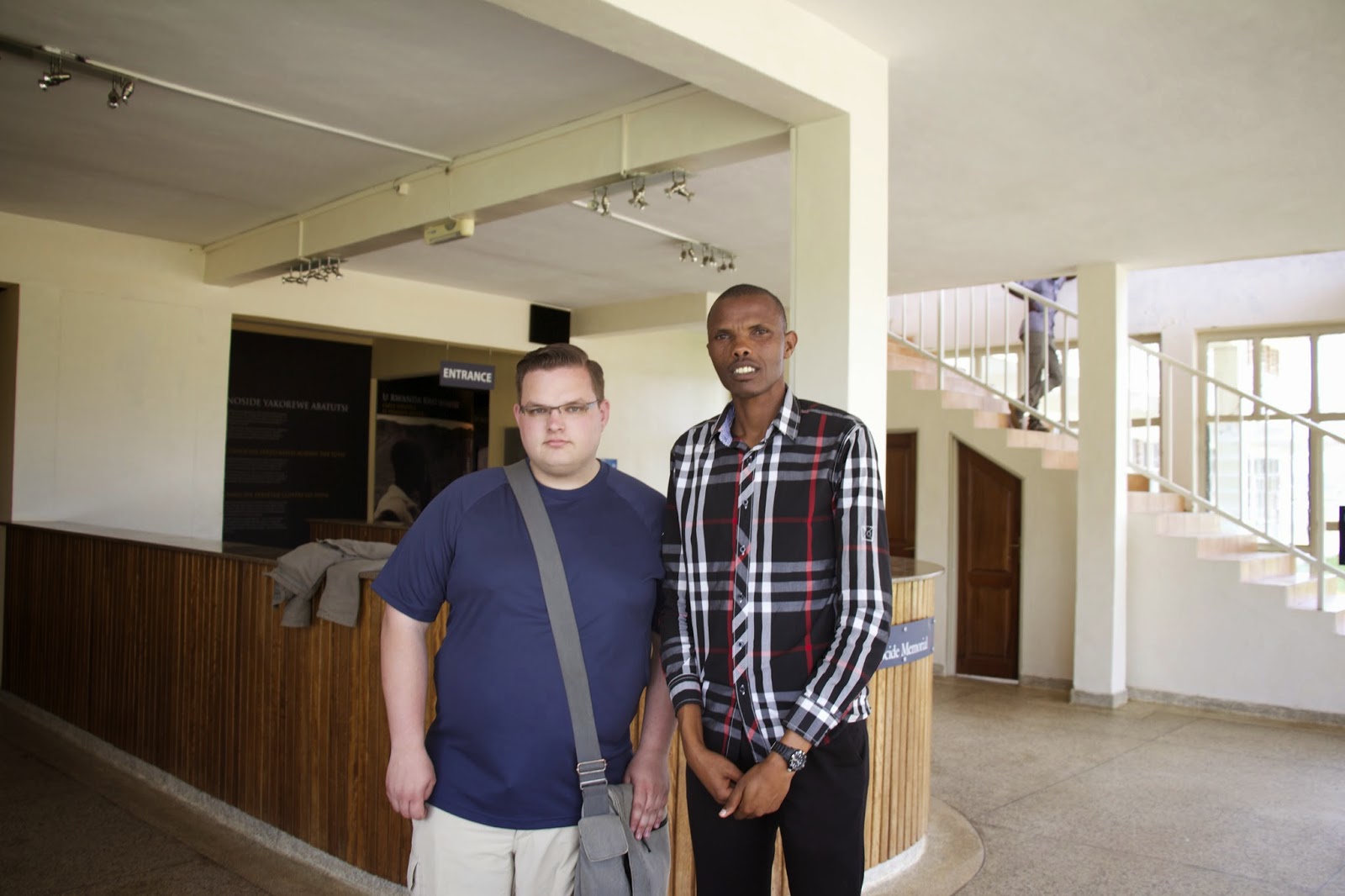 Michael with the tour guide at Murambi, who was also a genocide survivor