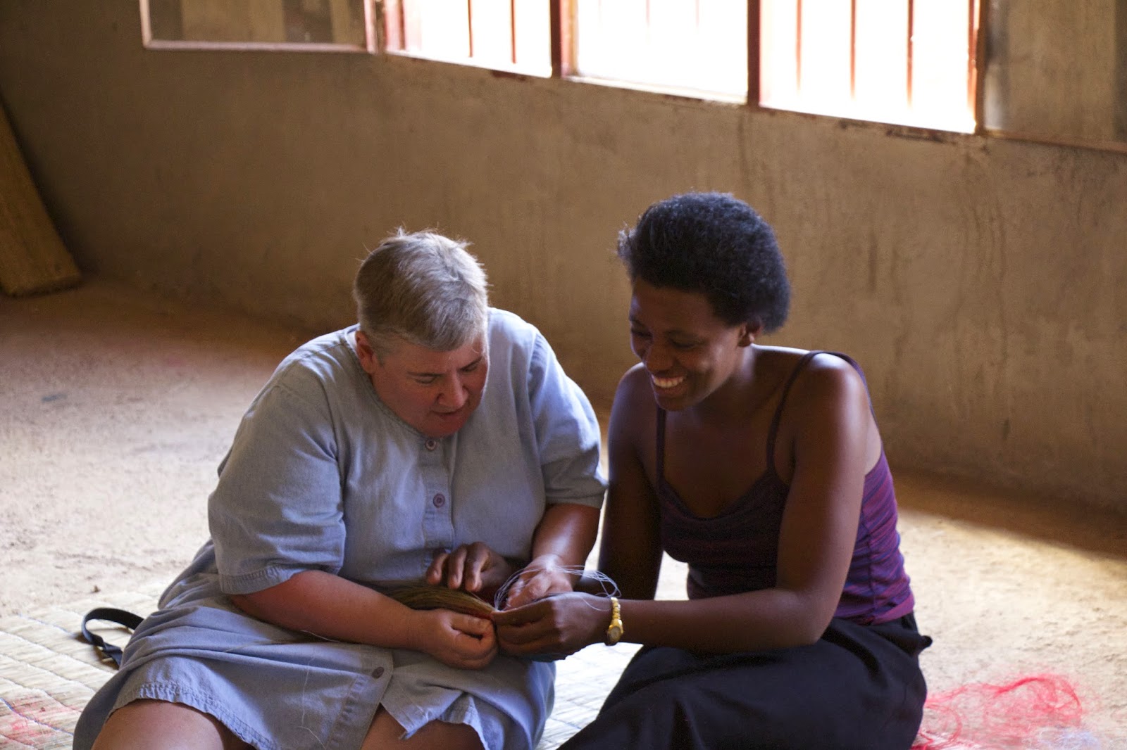 Dr. Gaydosh learning to weave a basket