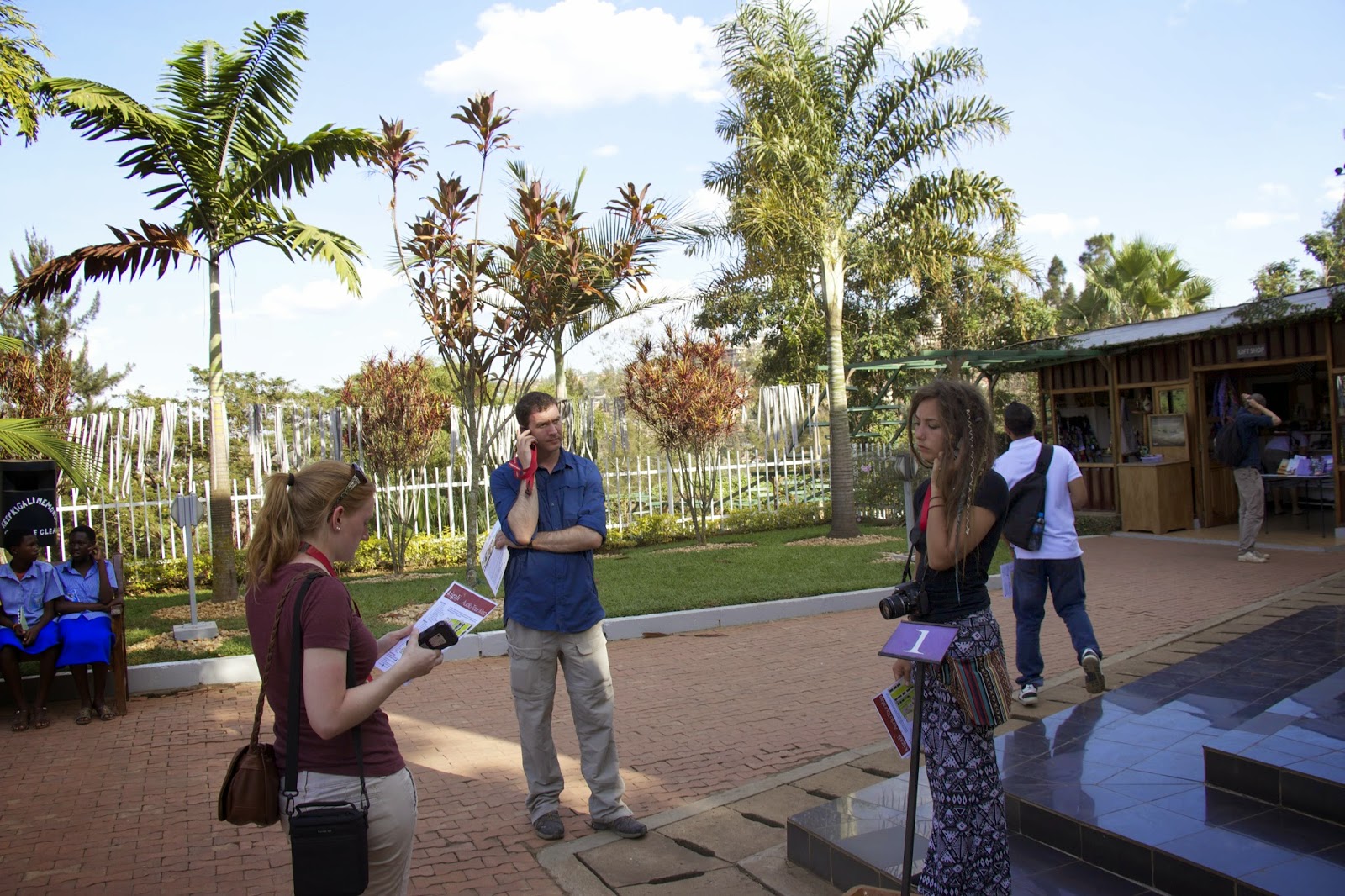 Listening to English audio tour at the Kigali Genocide Memorial