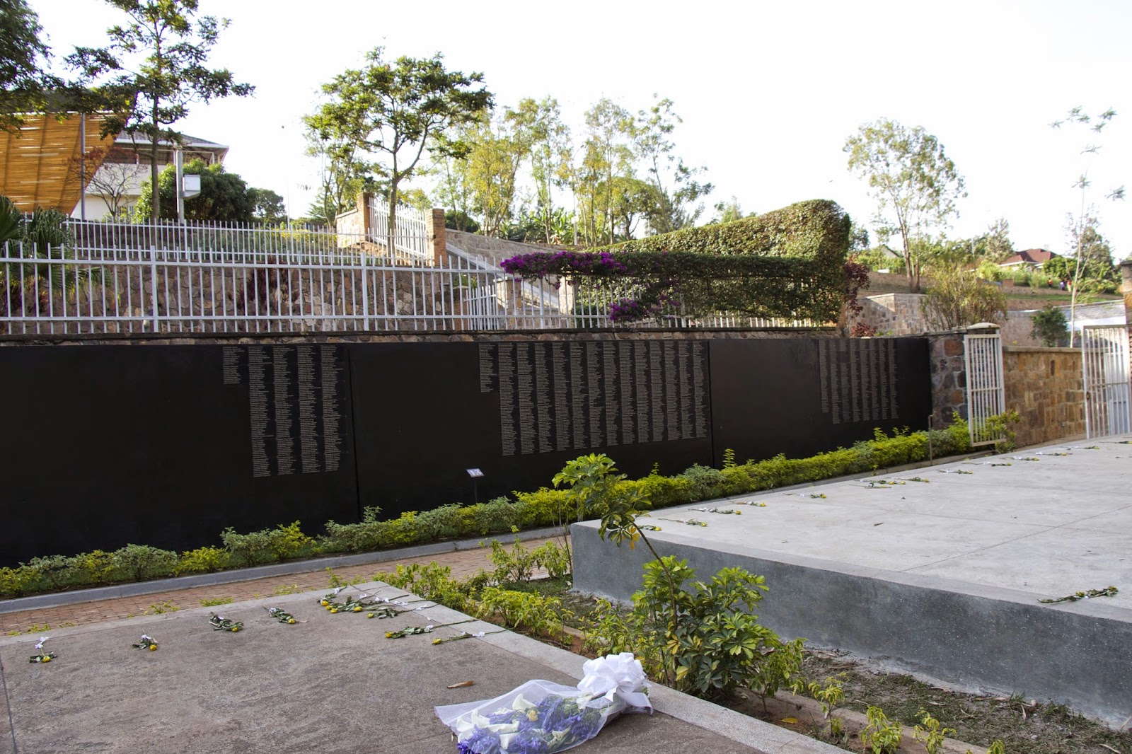 Wall of the dead listing names of victims
