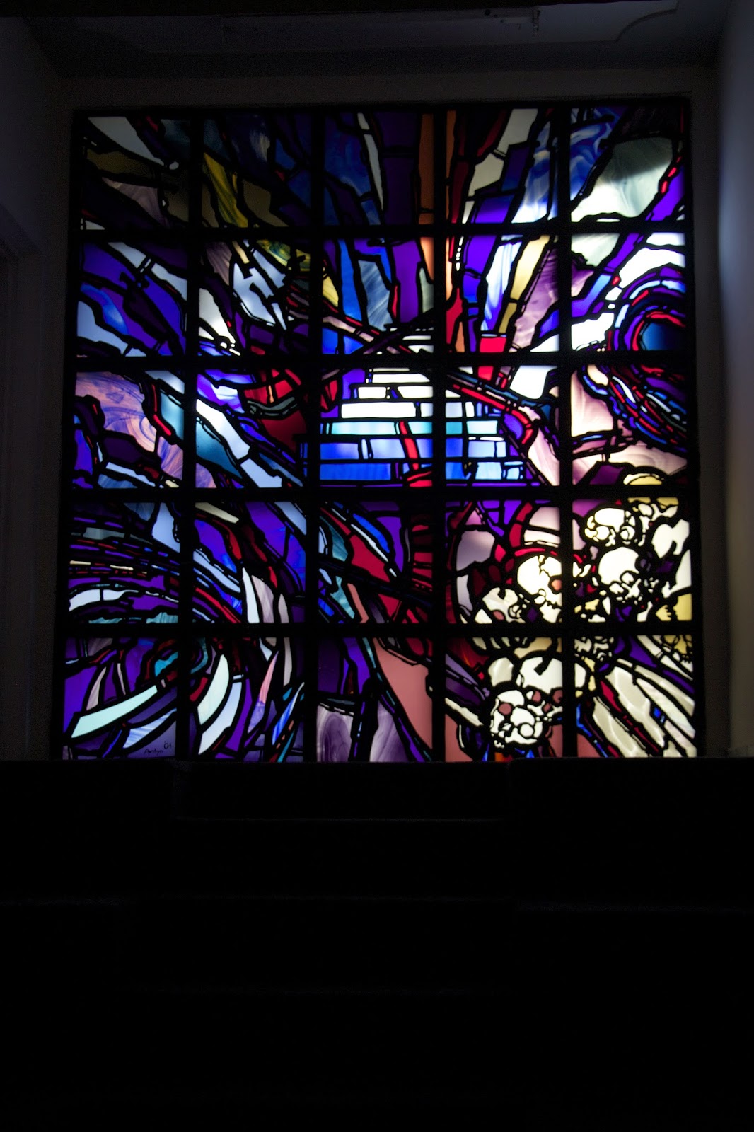 Stained glass depicting the start of the genocide