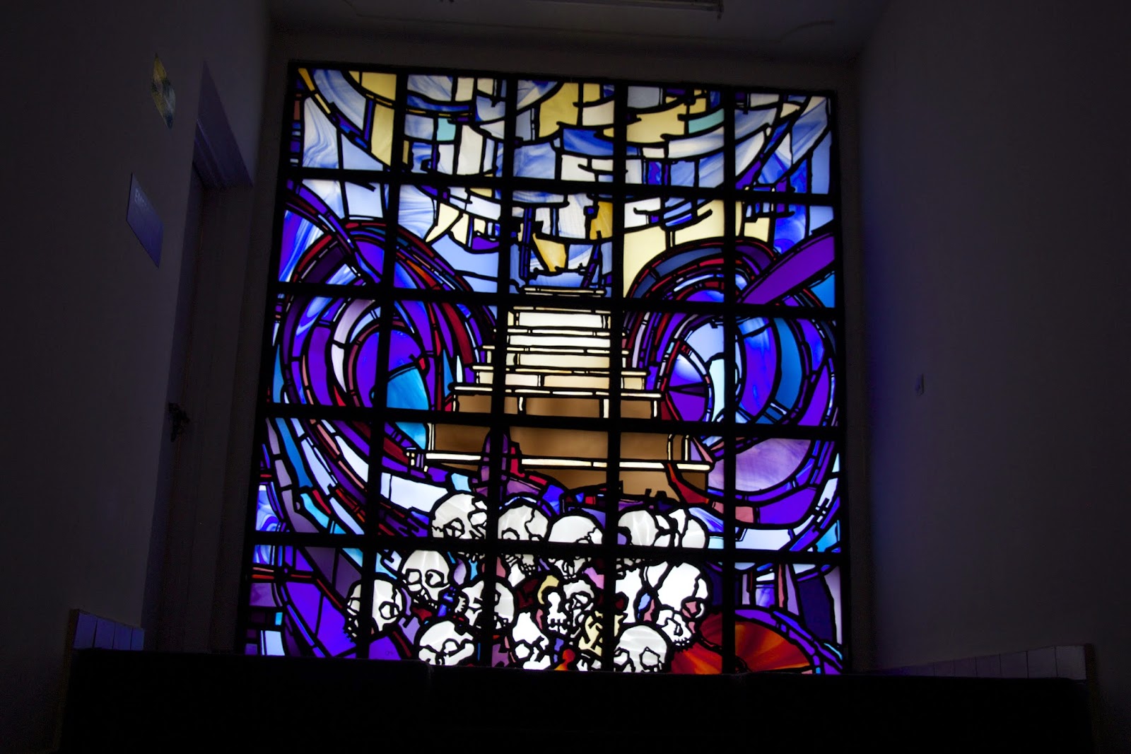 Stained glass depicting the aftermath of the genocide