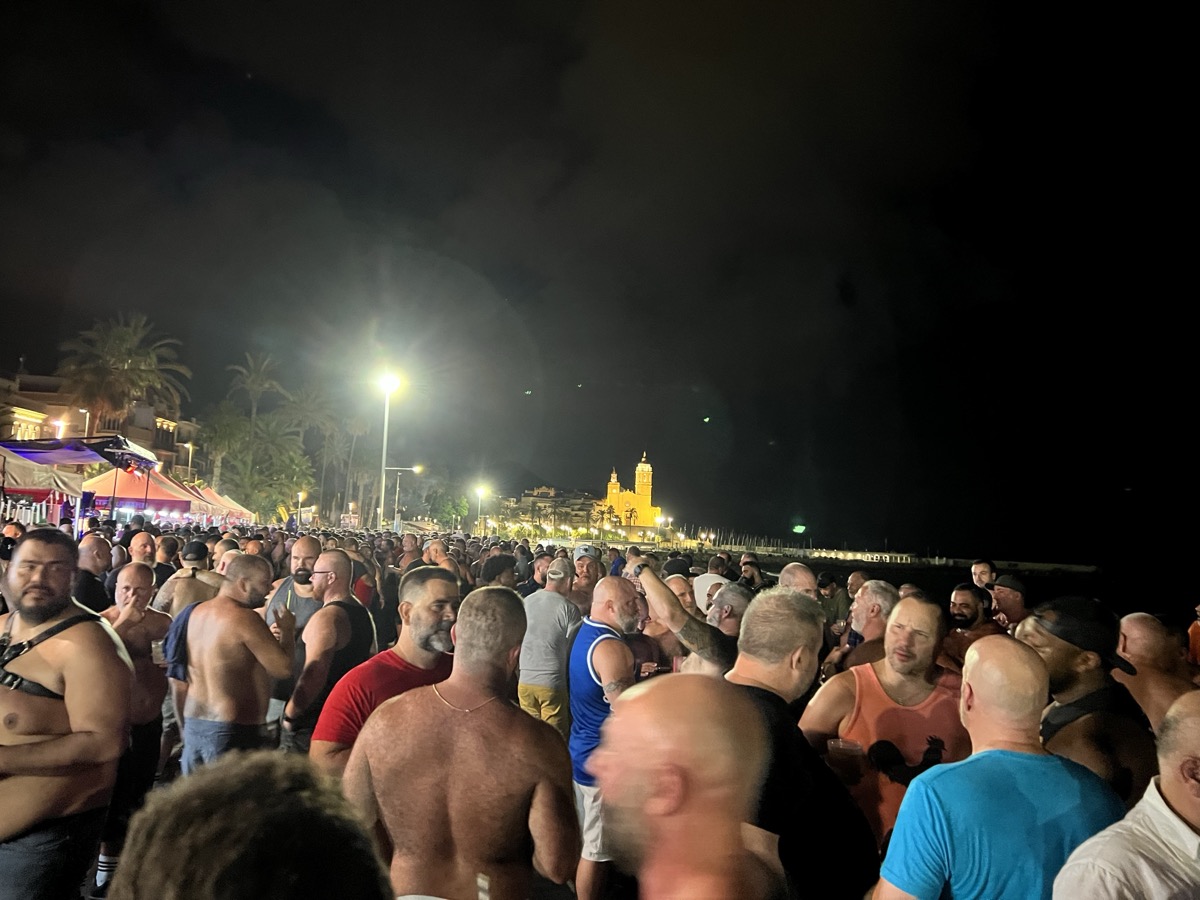 Bear Week crowd on Sitges promenade at night