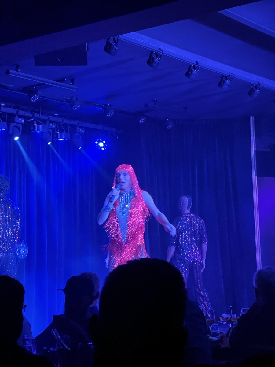 Two cabaret dancers performing on stage