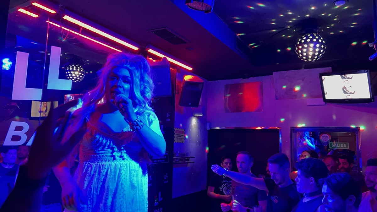 Performer singing at LL Bar