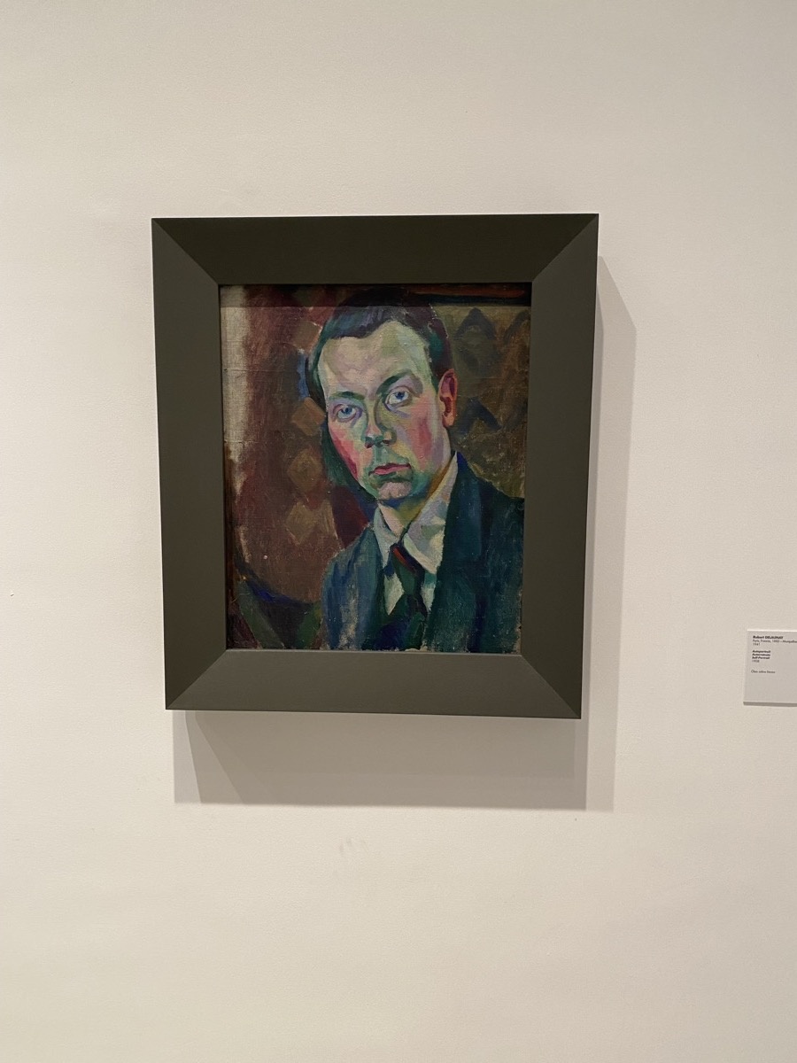 Colorful expressionist portrait in vivid greens and pinks