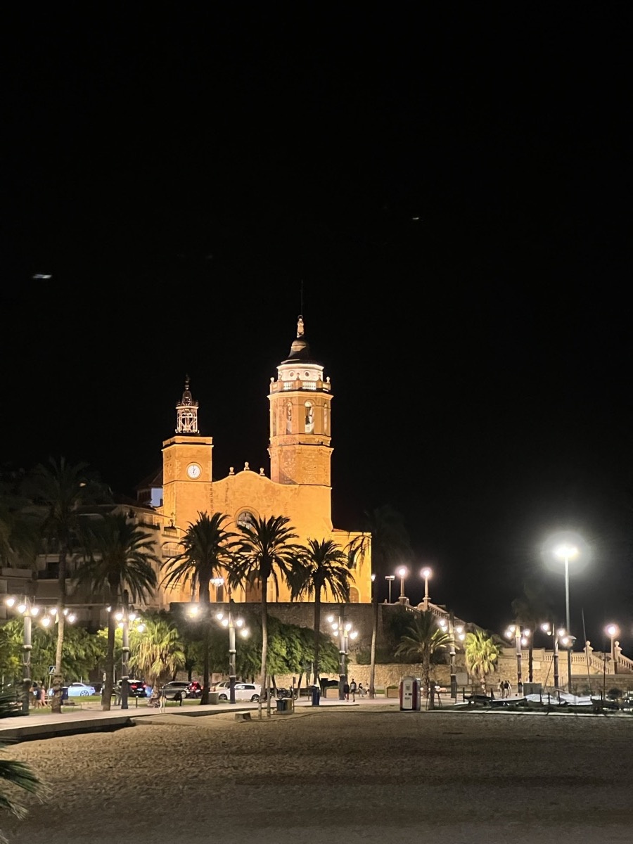 Church of Sant Bartomeu illuminated against night sky