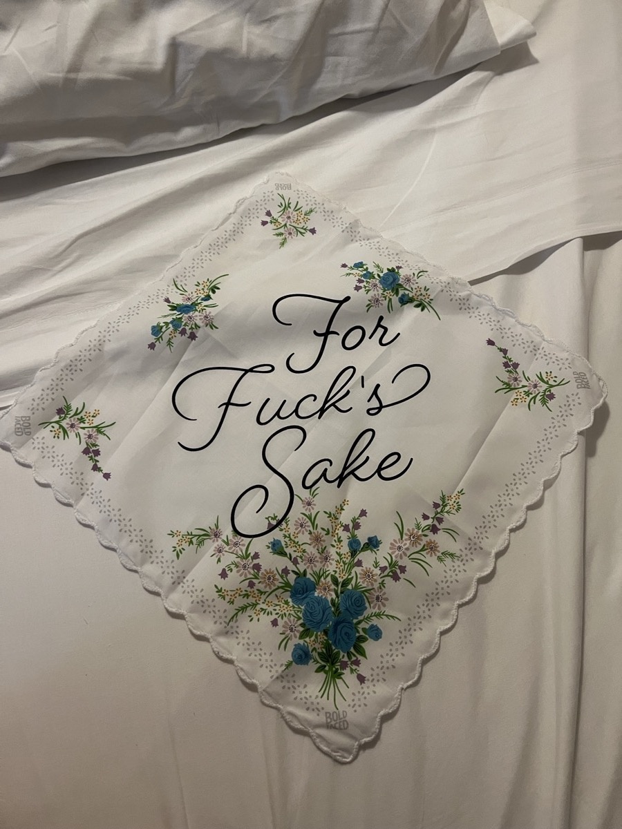Novelty handkerchief reading For F*ck's Sake on a bed