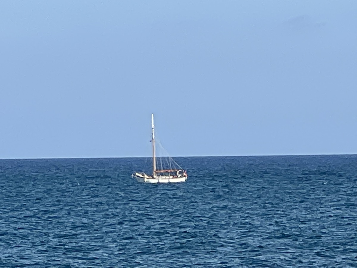 Sailboat on deep blue Mediterranean